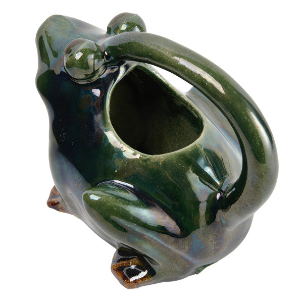 A green stoneware watering pitcher designed to resemble a frog.